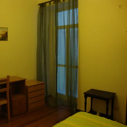 Rent this 6 bed room on Rua de Arroios 58 in 1150-056 Lisbon, Portugal