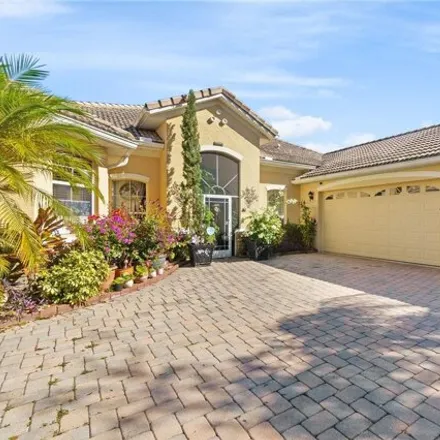 Buy this 4 bed house on 3821 Golden Feather Way in Osceola County, FL 34746