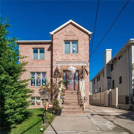 Buy this 5 bed townhouse on 4870 Hylan Boulevard in New York, NY 10312