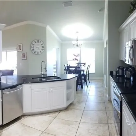 Buy this 4 bed house on 1290 Embers Parkway in Cape Coral, FL 33993