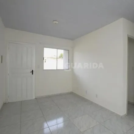 Rent this 2 bed house on Rua Afonso Arinos in Camaquã, Porto Alegre - RS
