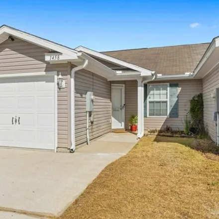 Buy this 2 bed townhouse on 1454 Dunhurst Drive in Ensley, FL 32534