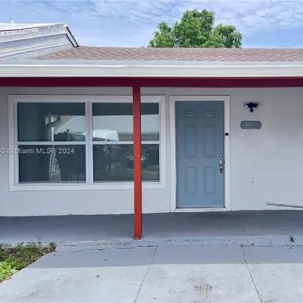 Rent this 3 bed townhouse on 18908 NW 46th Ave Unit 18908 in Miami Gardens, Florida