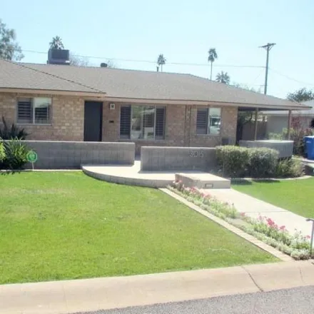Rent this 3 bed house on 3015 East Montecito Avenue in Phoenix, AZ 85016