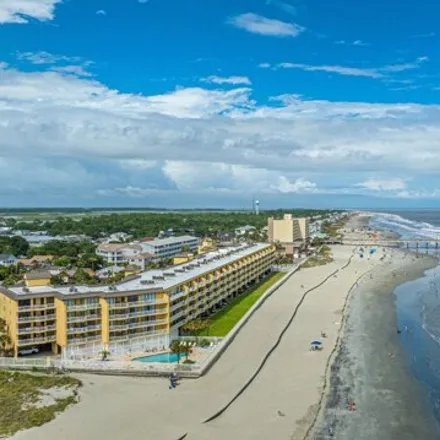 Buy this 4 bed condo on 201 W Arctic Ave Unit 406 in Folly Beach, South Carolina