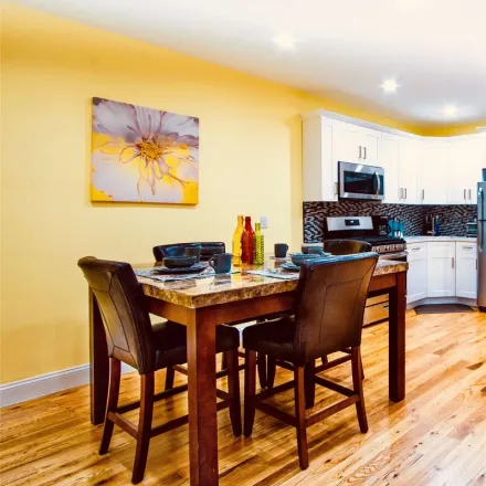Rent this 4 bed townhouse on East New York Avenue in New York, NY 11207
