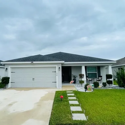 Buy this 4 bed house on Bellaria Court in Polk County, FL 33823