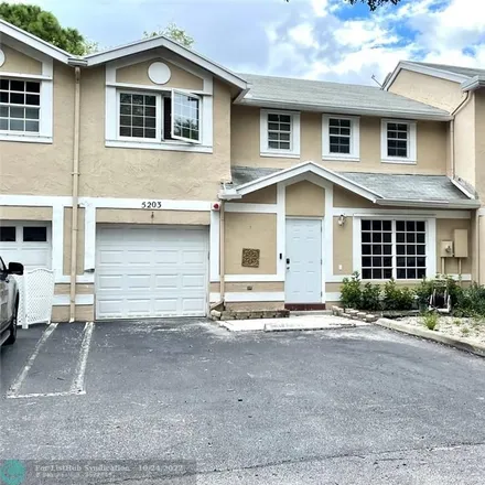 Rent this 4 bed townhouse on 5203 Southwest 121st Terrace in Cooper City, FL 33330