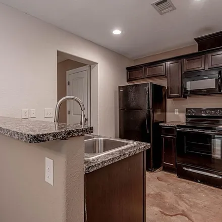 Rent this 2 bed apartment on 2039 20th Street in Huntsville, TX 77340