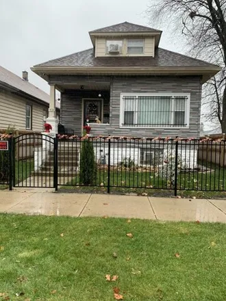 Buy this 6 bed house on 1437 West 71st Place in Chicago, IL 60636