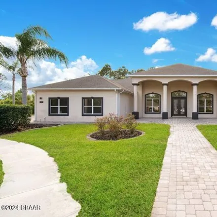 Buy this 4 bed house on 1604 Promenade Circle in Port Orange, FL 32129