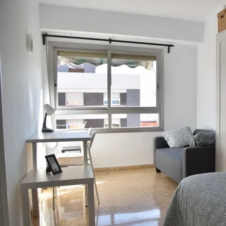 Rent this 8 bed room on Hospital Casa de la Salud in Carrer d'Abén Al-Abbar, 46021 Valencia