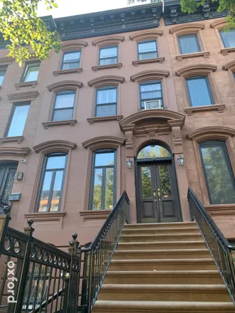 Buy this 5 bed townhouse on 16 East 129th Street in New York, NY 10035