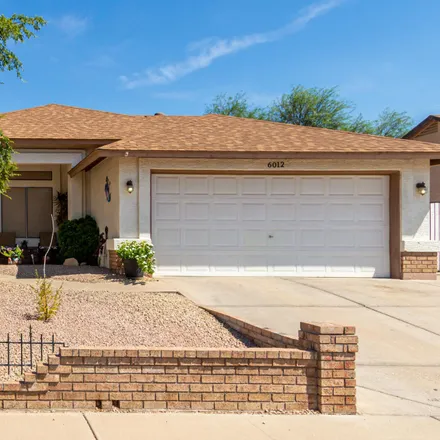 Buy this 4 bed house on 6012 West Garden Drive in Glendale, AZ 85304