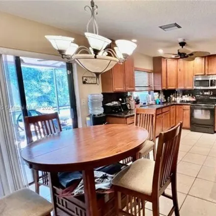 Buy this 3 bed house on 1598 Northwest 112th Way in Coral Springs, FL 33071