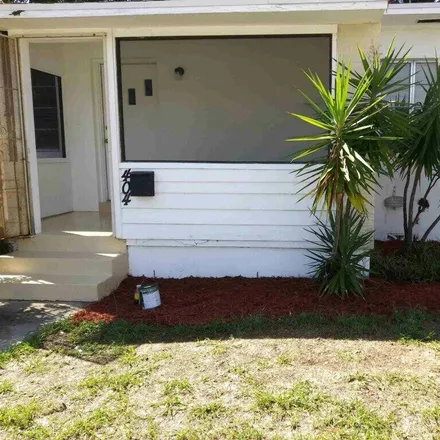 Rent this 2 bed townhouse on 404 49th Street in West Palm Beach, FL 33407