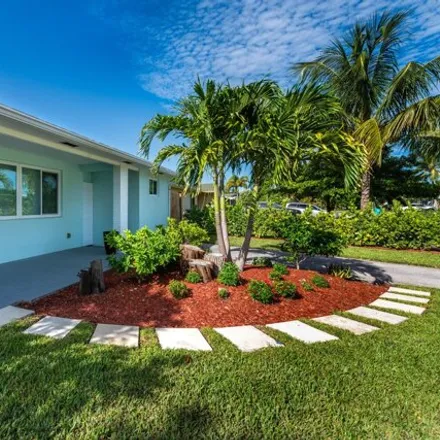 Rent this 3 bed house on 172 Southeast 27th Way in Chapel Hill, Boynton Beach