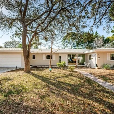 Buy this 3 bed house on 1215 Taylor Ave in Dunedin, Florida