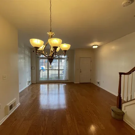 Rent this 2 bed townhouse on 371 Custer Avenue in Greenville, Jersey City