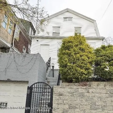 Buy this 4 bed house on 101 Scribner Avenue in New York, NY 10301
