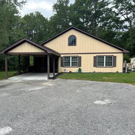 Buy this 4 bed house on 8780 River Road Southeast in Brunswick County, NC 28461