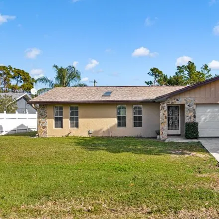 Buy this 3 bed house on 531 Karney Avenue Northeast in Palm Bay, FL 32907