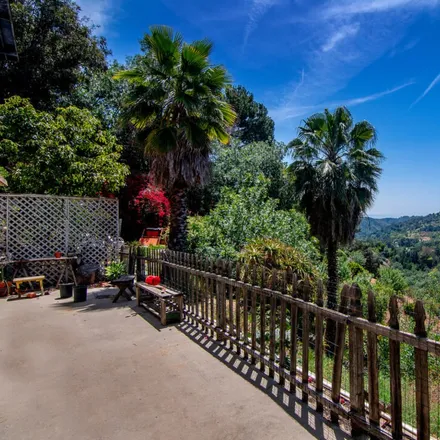 Buy this 4 bed house on 3197 Benedict Canyon Drive in Beverly Hills, CA 90210