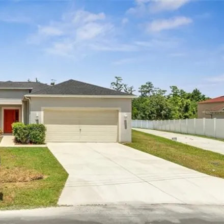 Buy this 4 bed house on 709 Tahiti Dr in Kissimmee, Florida