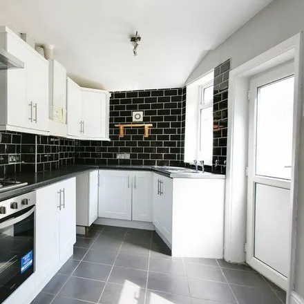 Rent this 2 bed townhouse on 101 Greenway Road in Dukesfield, Runcorn