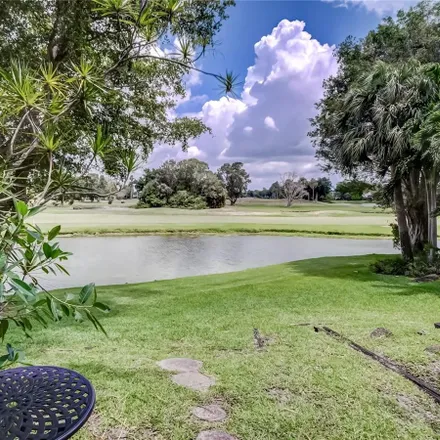 Buy this 2 bed condo on 6807 Brookline Drive in Country Club, Hialeah