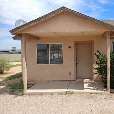 Rent this 3 bed house on 14282 S Durango Rd Unit 4 in Arizona City, Arizona