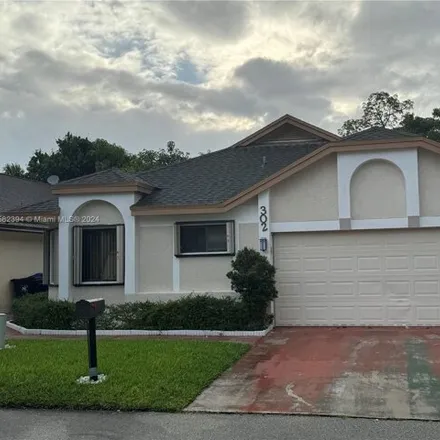 Rent this 3 bed house on 302 Bishop Road in Sabal Palms Estates, North Lauderdale