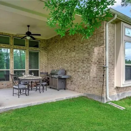 Rent this 4 bed house on 39 East Wading Pond Circle in The Woodlands, TX 77375