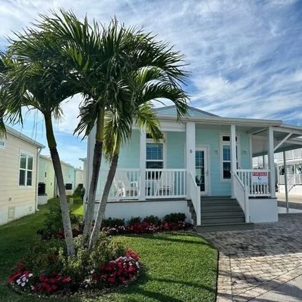 Buy this studio apartment on 99 Northeast Nautical Drive in Ocean Breeze, Martin County