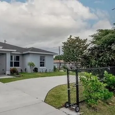 Rent this 3 bed house on 806 Bradley Street in West Palm Beach, FL 33405