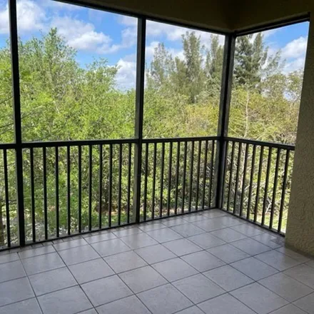 Rent this 3 bed apartment on 10082 Lake Cove Drive in Lee County, FL 33908