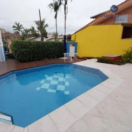 Rent this 4 bed house on Alameda do Bonfim in São Lourenço, Bertioga - SP