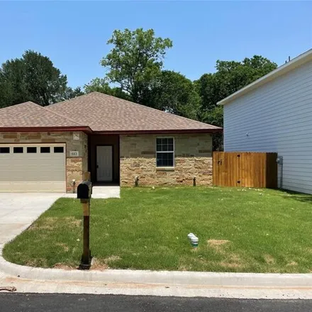 Rent this 3 bed house on 667 East 7th Street in Bonham, TX 75418