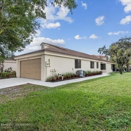 Buy this 3 bed house on 3818 Northwest 21st Street in Coconut Creek, FL 33066