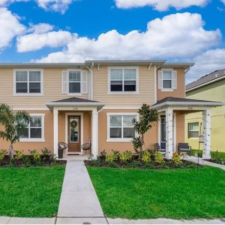 Buy this 3 bed townhouse on Tidal Alley in Orange County, FL 32829
