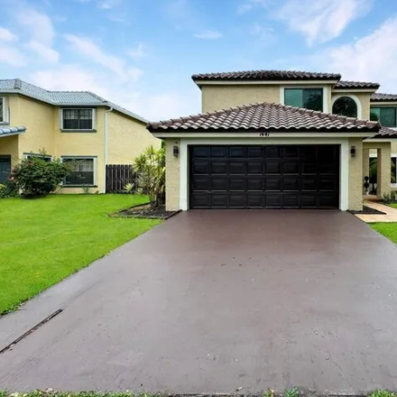 Buy this 4 bed house on 1441 SW 88th Ave in Pembroke Pines, Florida