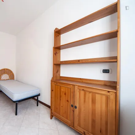 Rent this 3 bed room on Viale Raf Vallone in 73, 00173 Rome RM