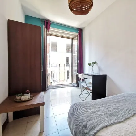 Rent this 9 bed room on Madrid in Calle de Atocha, 51