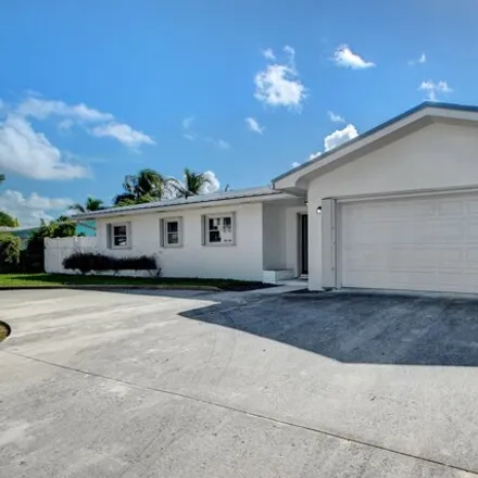 Buy this 4 bed house on 1151 Bimini Lane in Palm Beach Isles, Riviera Beach