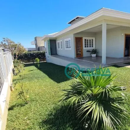 Buy this 5 bed house on Drogaria Araújo in Rua Acadêmico Nilo Figueiredo, Lagoa Santa - MG