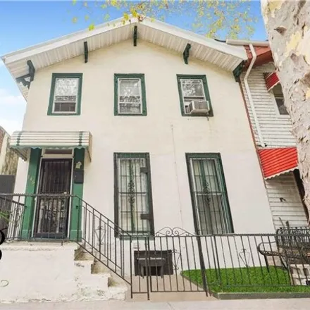 Buy this 3 bed house on 146 Cambridge Place in New York, NY 11238