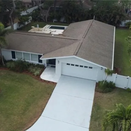 Buy this 4 bed house on 627 Oakridge Lane in Belleair Bluffs, Pinellas County