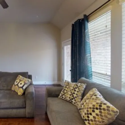 Rent this 3 bed apartment on 5204 Grove Cove Drive in Heatherwood, McKinney