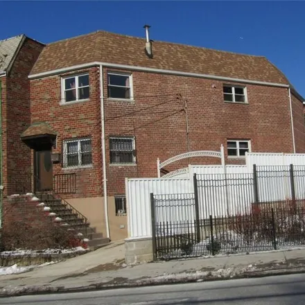 Buy this 4 bed house on 80-93 Cypress Avenue in New York, NY 11385