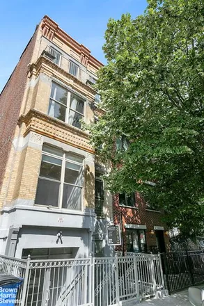 Buy this studio townhouse on 305 WEST 123RD STREET in Central Harlem